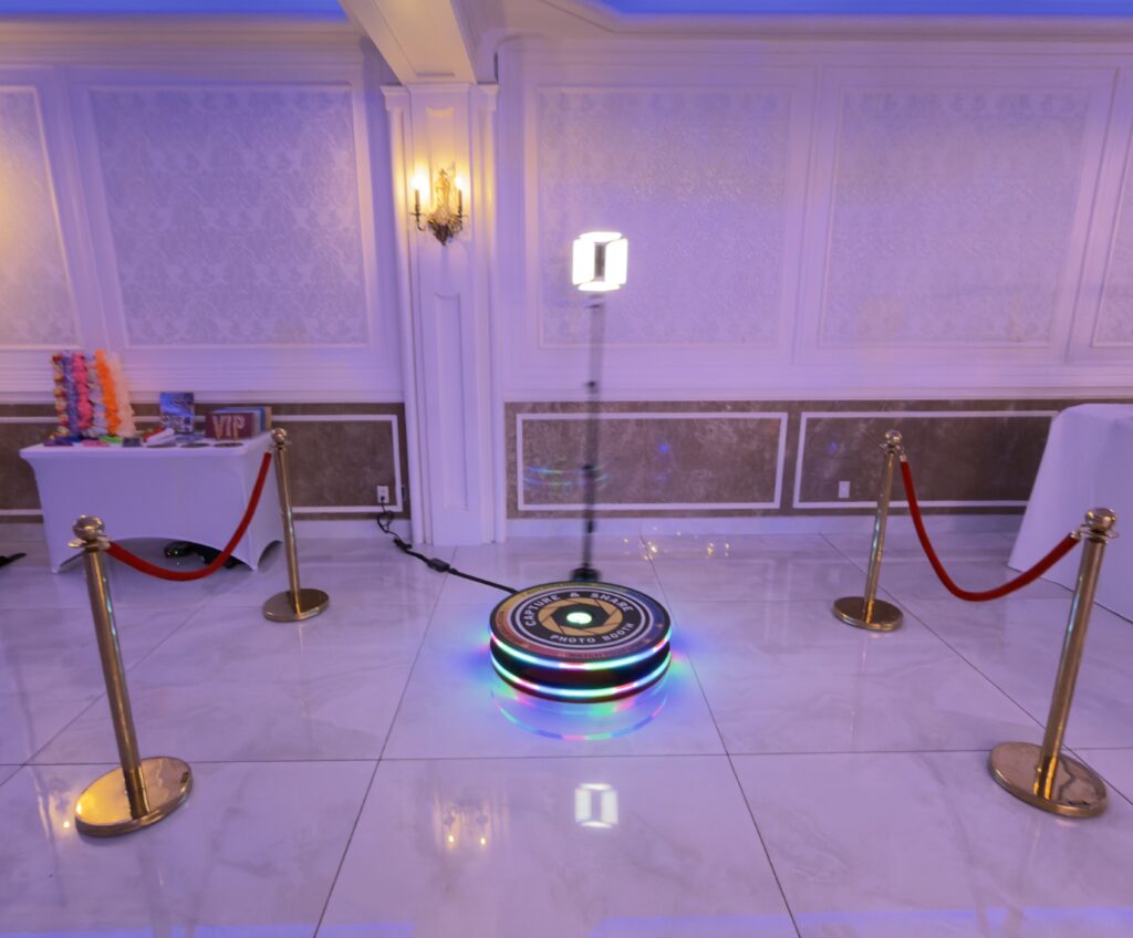 360 Photo Booth with Gold Stanchions and red rope